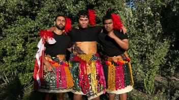 Three PISA members in traditional Tongan cultural attire